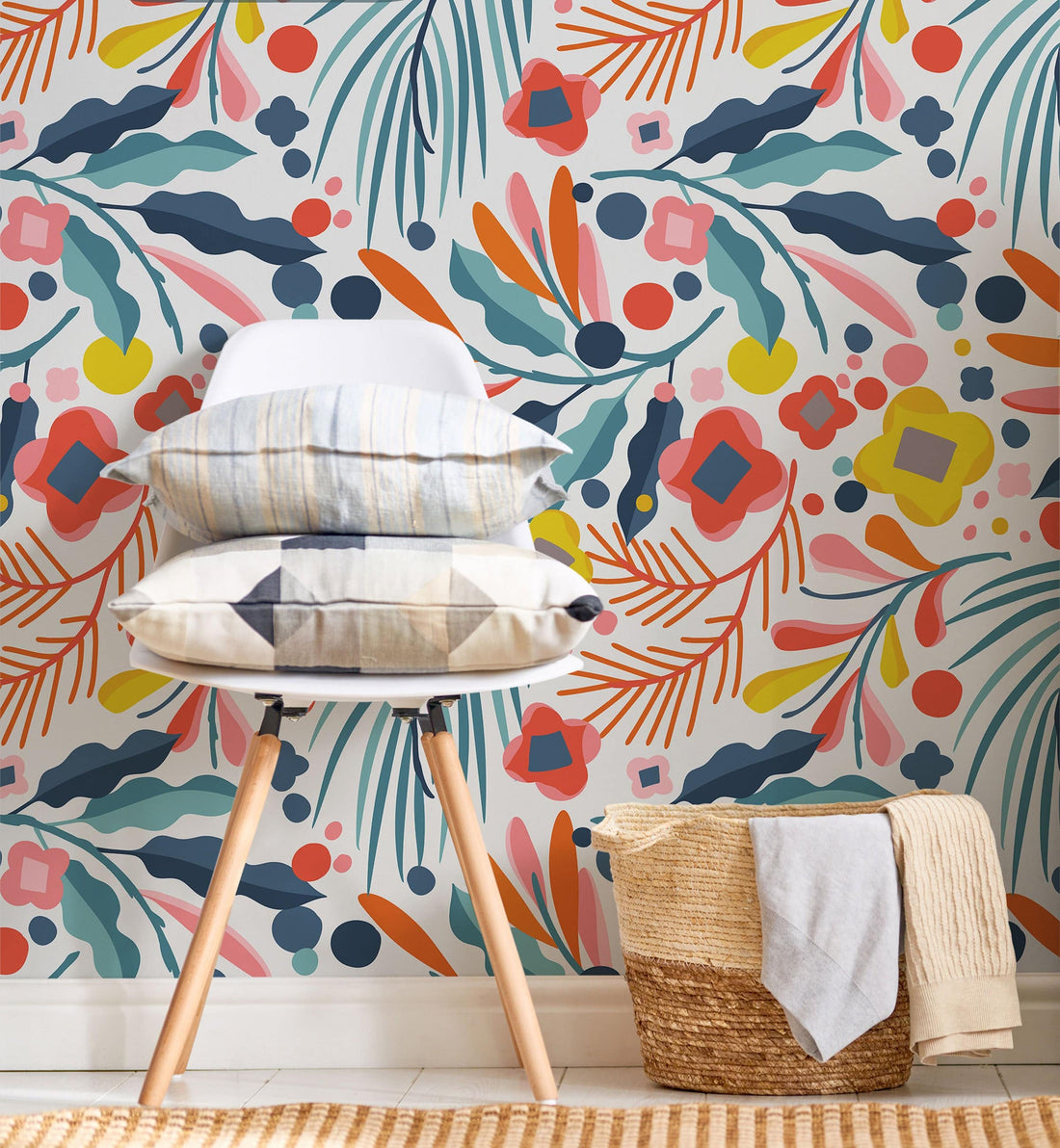 Colorful tropical floral abstract smooth peel & stick wallpaper with bold leaves, flowers, and dots in pink, orange, navy, and teal tones – modern peel-and-stick design.